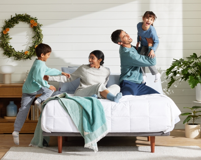 Family on a Purple bed