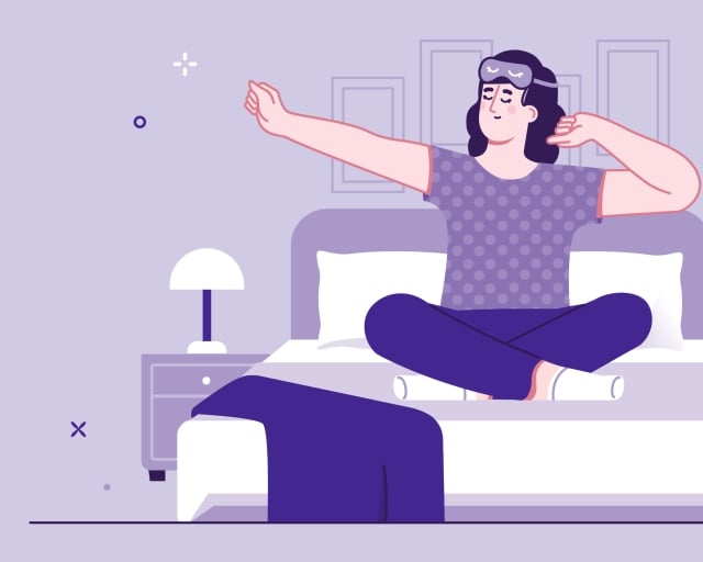 woman sitting in bed