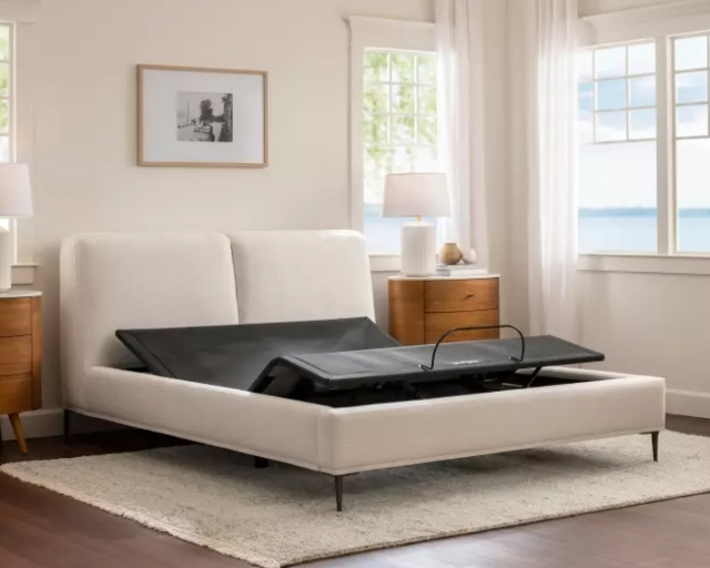 A Purple Premium Smart Base in a bright beachside bedroom.
