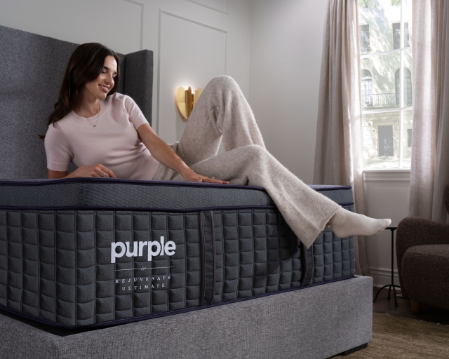 Woman lounging on RejuvenateUltimate mattress