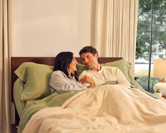 couple laying in bed together