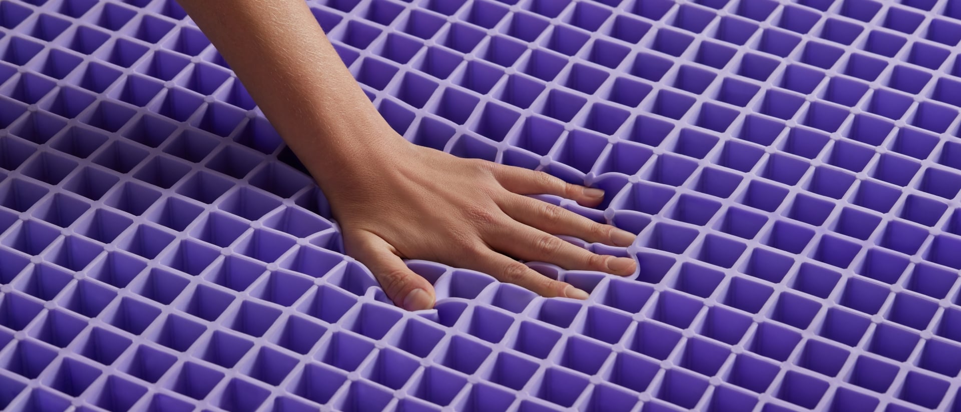 Hand on Purple Grid
